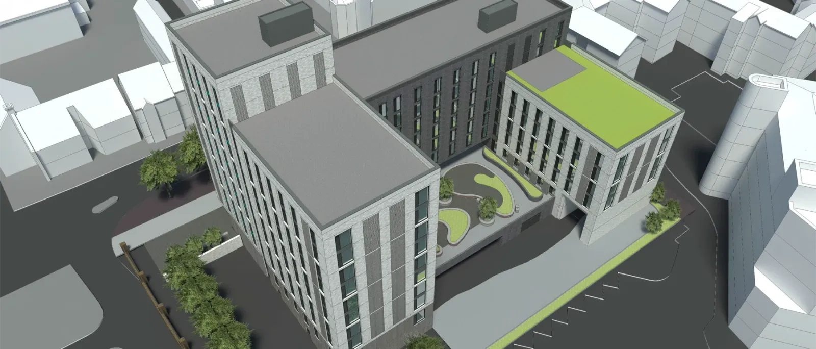 A digital aerial view of a modern multi-story building complex with gray facades and a rooftop green space. The complex surrounds a central courtyard with winding pathways and landscaping. The building is located in an urban area, with parking spaces and streets visible around it.